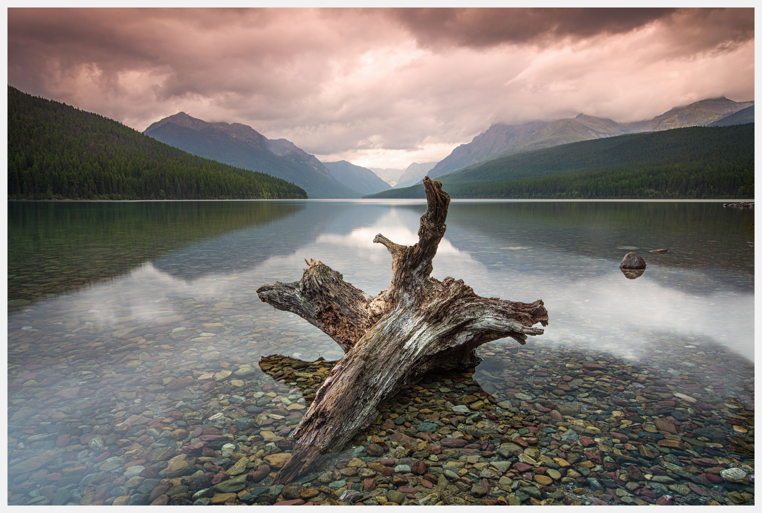 Clear-lake-with-dramatic-sky-glacier-national-park-montana