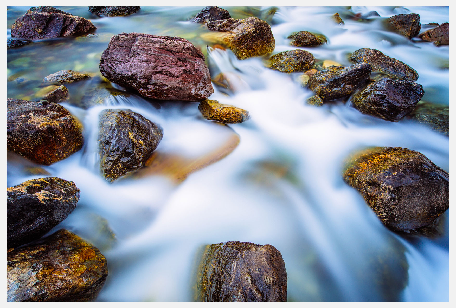 Water-Flowing-Over-Boulders-Glacier-National-Park-Montana